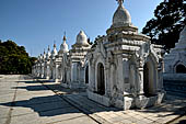 Myanmar - Mandalay, Kuthodaw Pagoda. 729 white pitaka pagodas contain the Tipitaka, the sacred texts of Theravada Buddhism. 